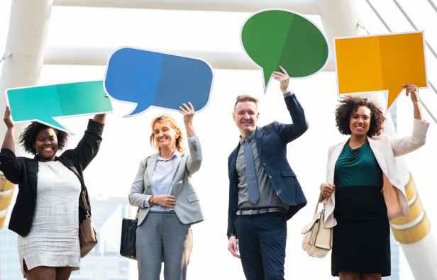 group of people holding message boards